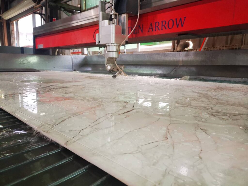 tassino waterjet cutting a porcelain slab